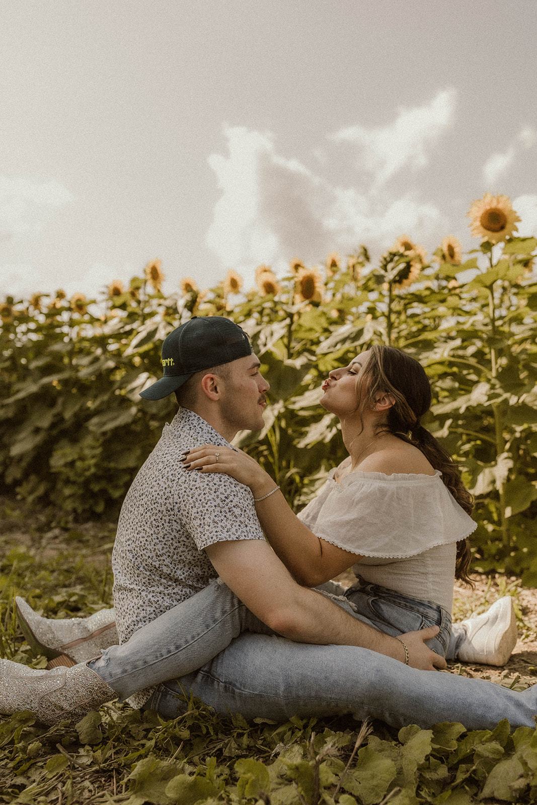 Stunning Adventure Filled Couples Photos in Sunflower field.