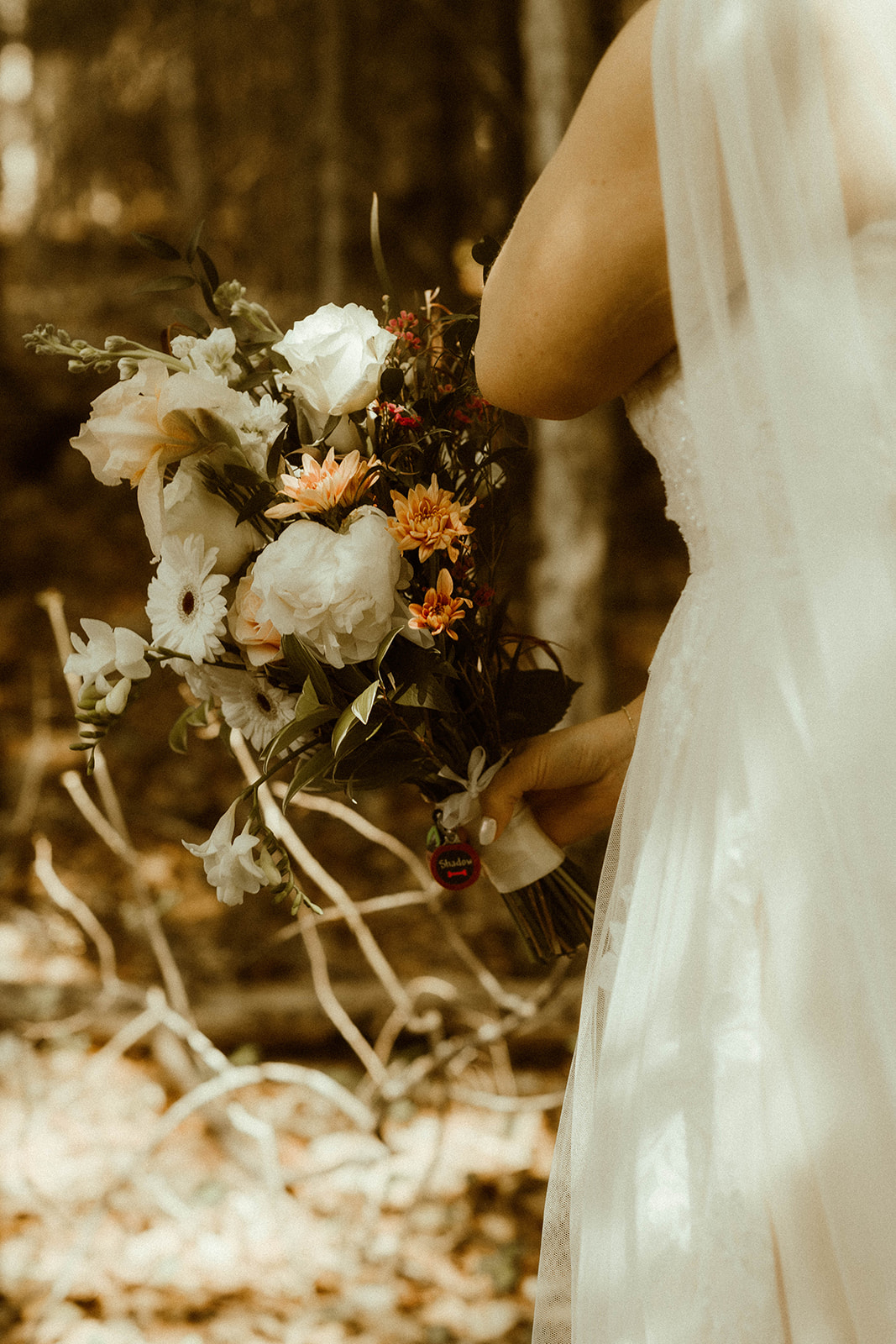Stunning brides bouquet before her adventurous Adirondack mountain elopement