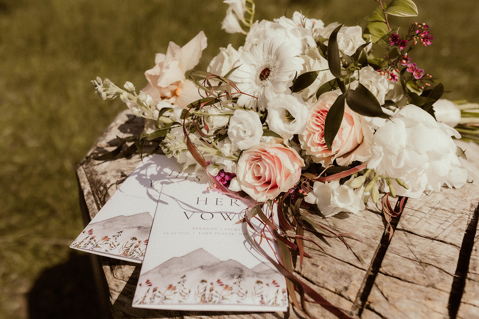 Flat-lay of bouquet and wedding details of a dreamy Adirondack mountain elopement