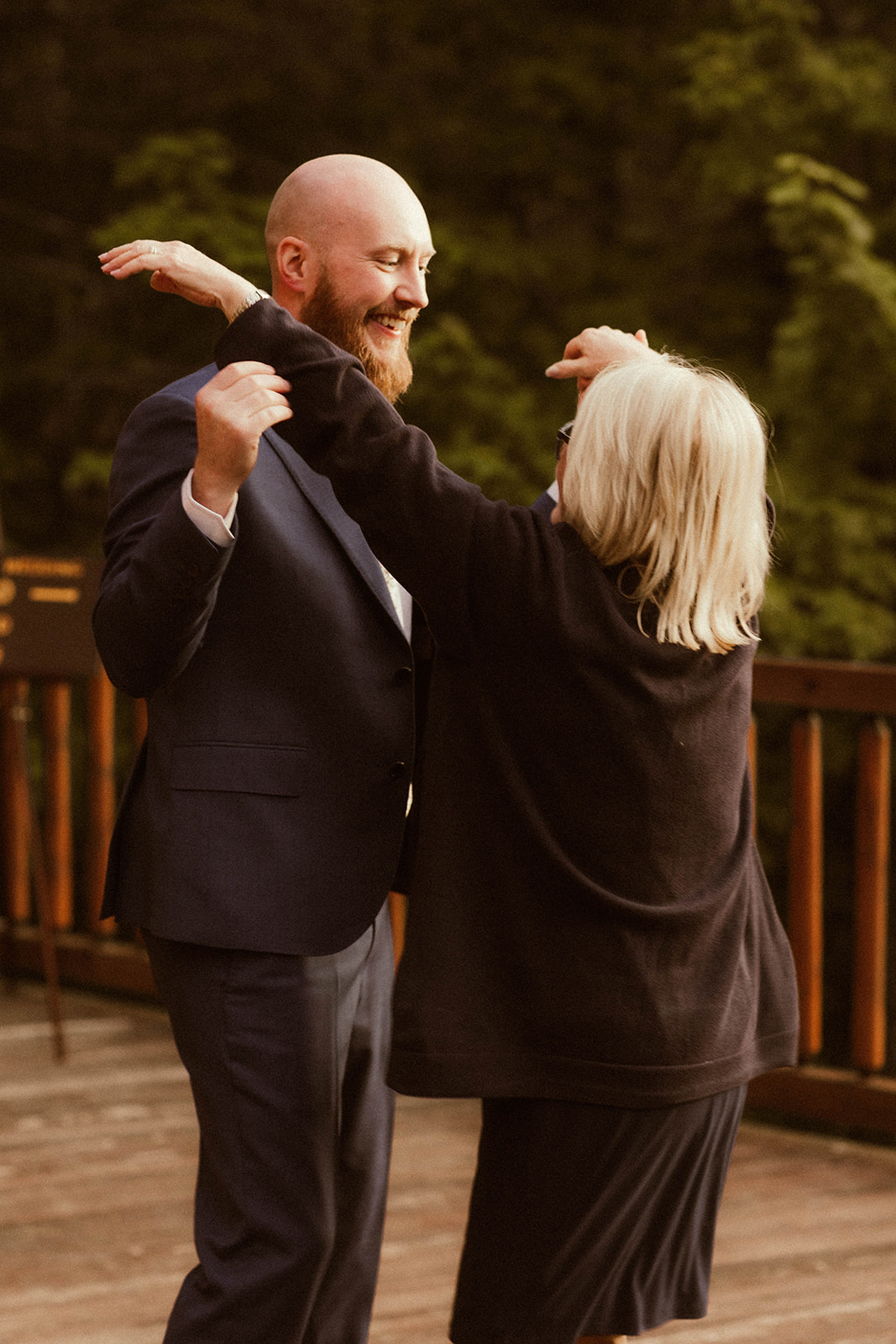 Groom shares a dance with his mom after his Adirondack elopement