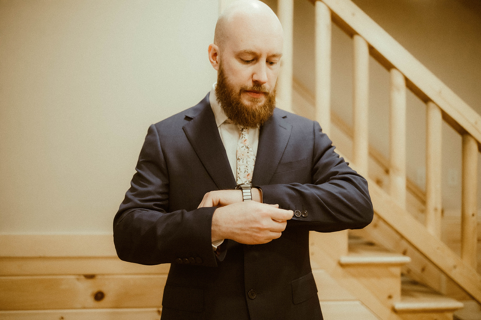 A groom prepares for his Adirondack mountain elopement