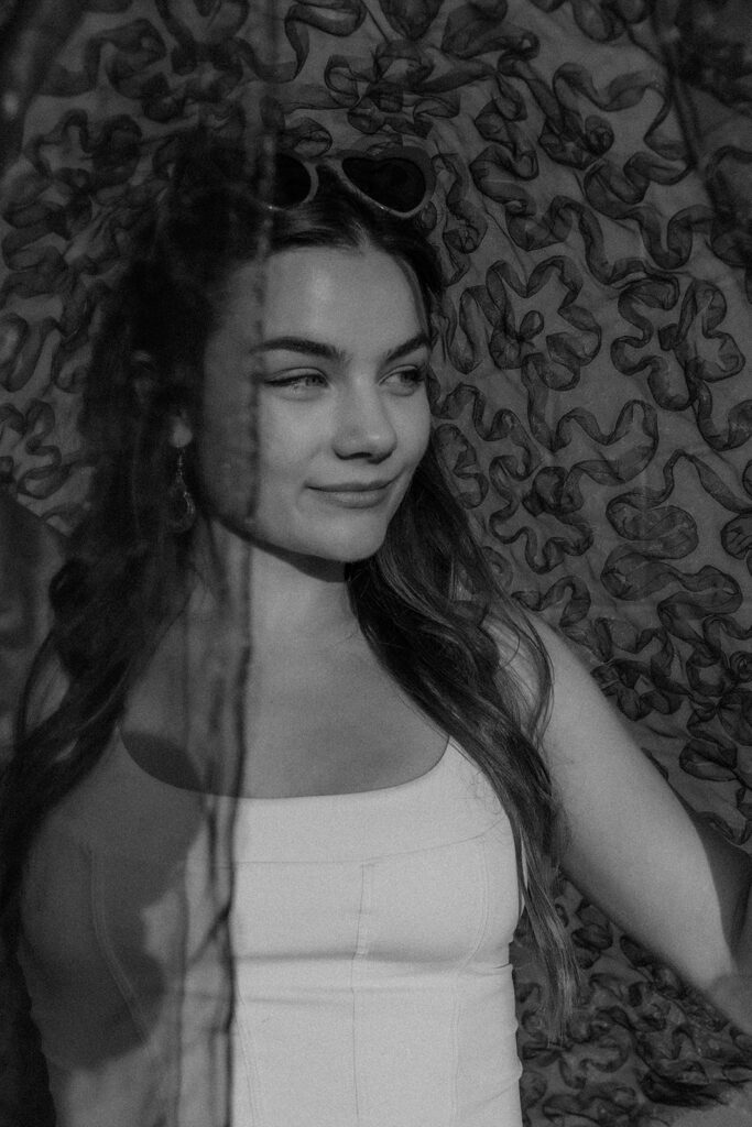 black and white photo of stylish woman