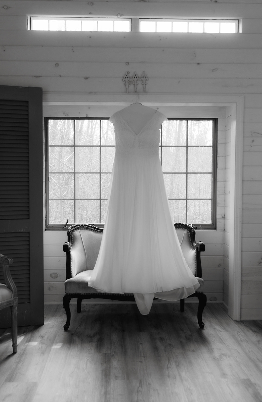 wedding dress hanging up ready for the dreamy upstate New York wedding