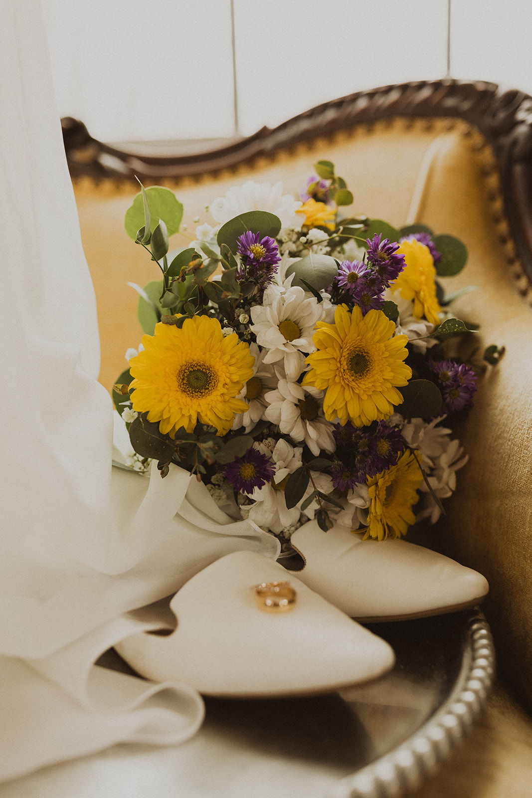 Brides bouquet waits patiently as she prepares for her dreamy upstate New York wedding day
