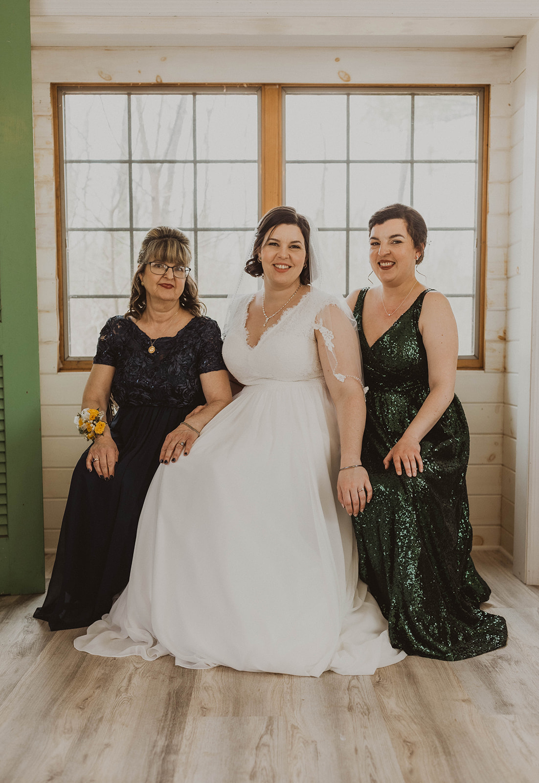 Bride poses with family before her dreamy upstate new york wedding ceremony