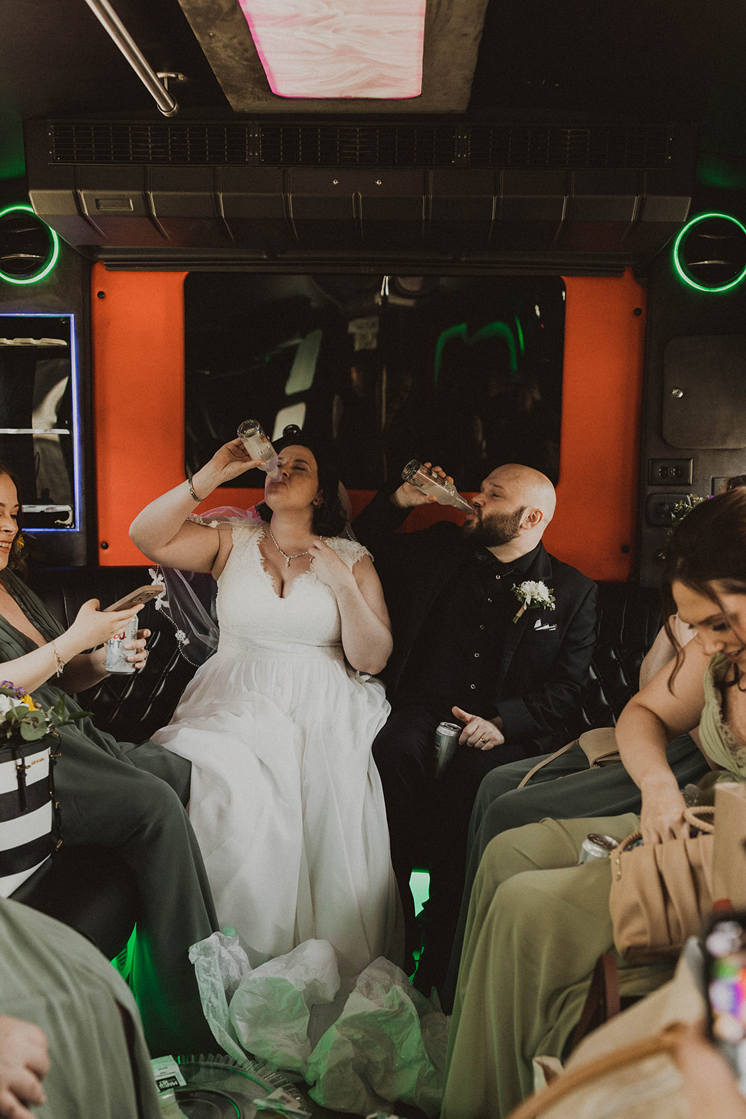 The wedding party rides the party bus together!