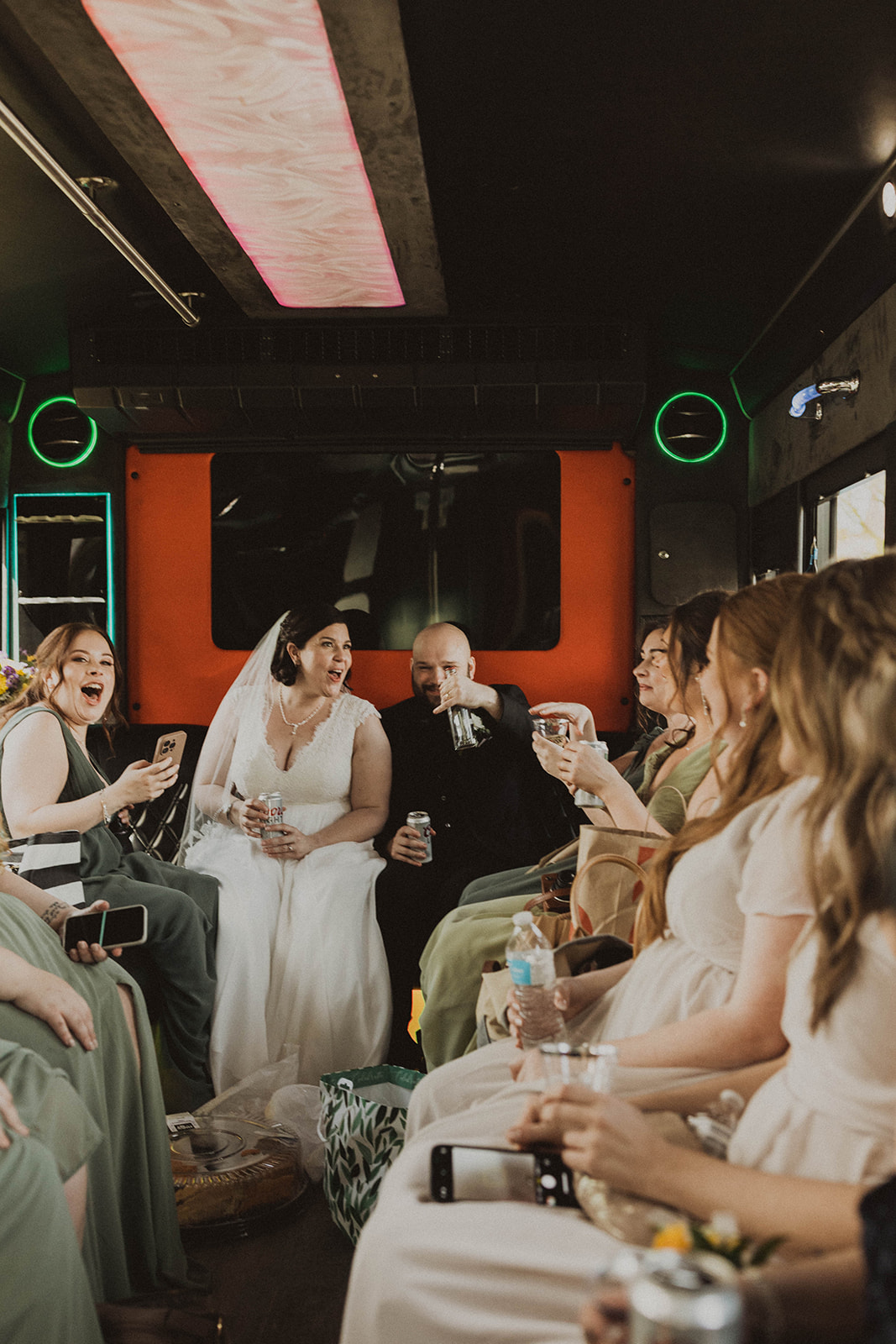 The wedding party rides the party bus together!