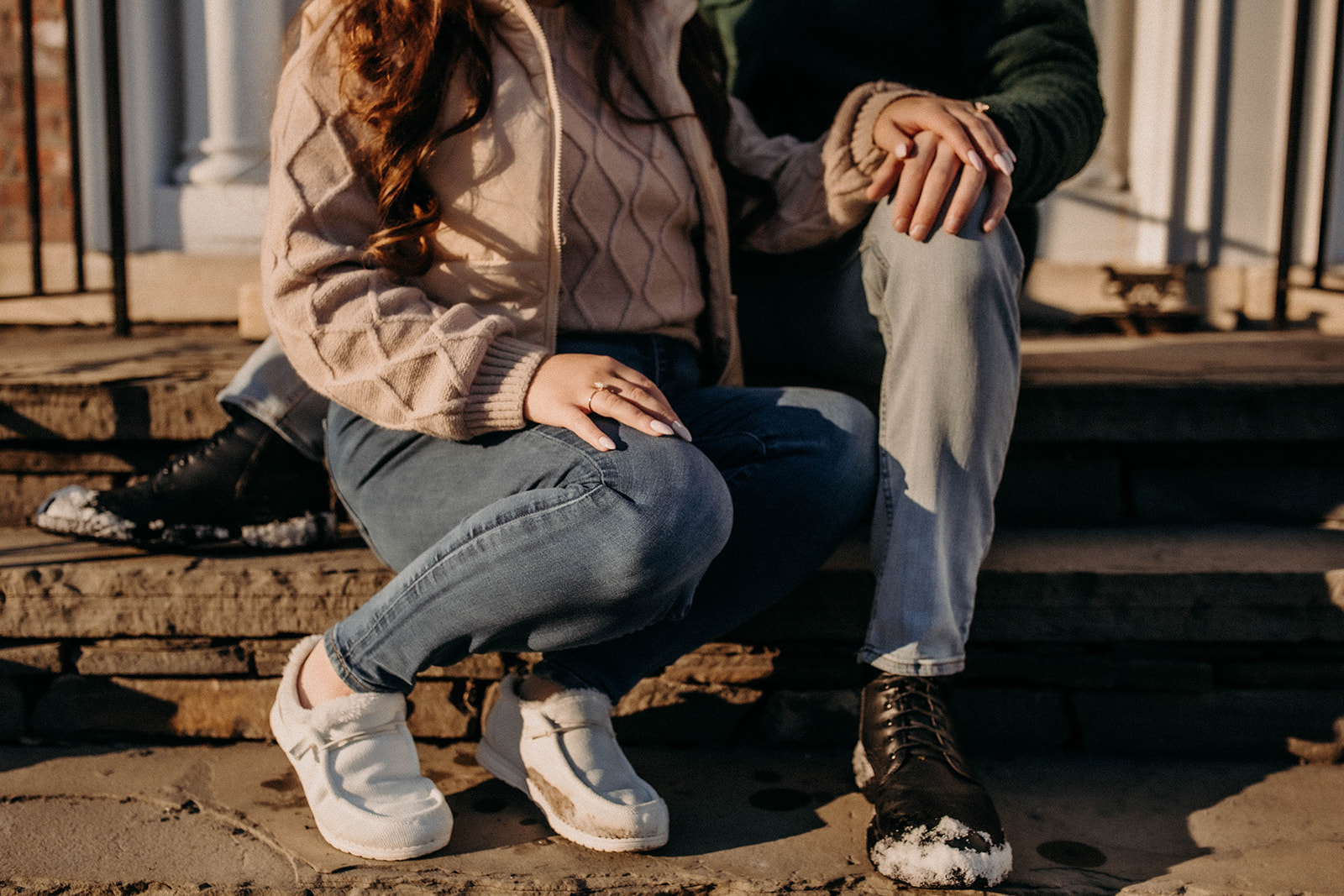 Couple sit together during their dreamy winter engagement photoshoot in Rensselaerville New York!