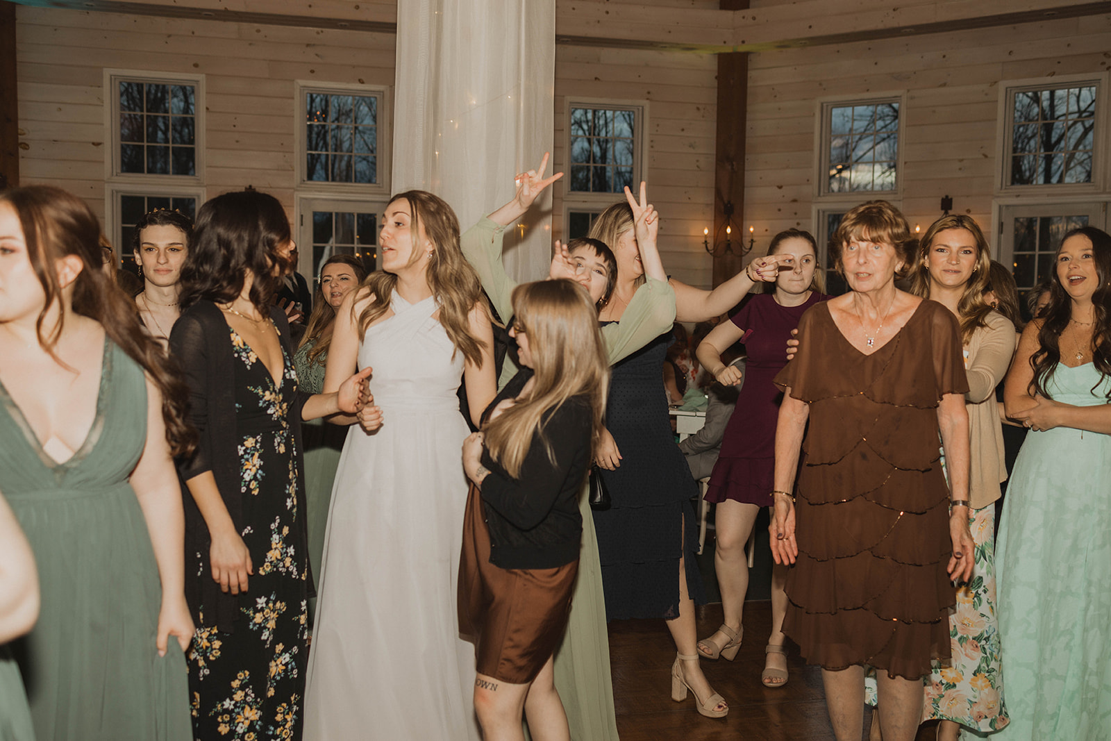Wedding guests enjoy the dance floor
