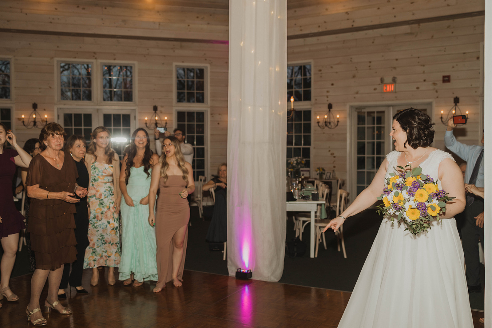 Bride gets ready to toss the bouquet!