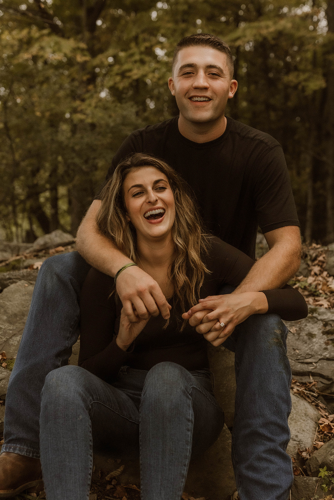 Beautiful couple share a laugh while during their Upstate NY Engagement Photos