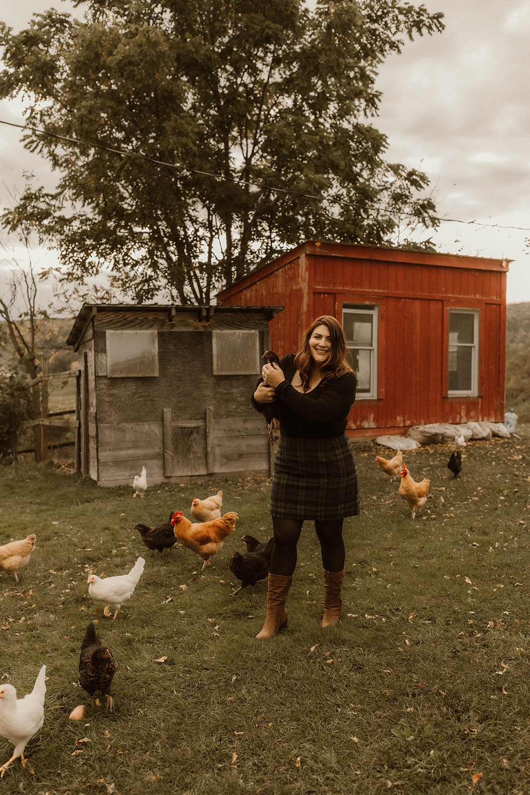 Future bride poses with her chickens during upstate New York farm engagement