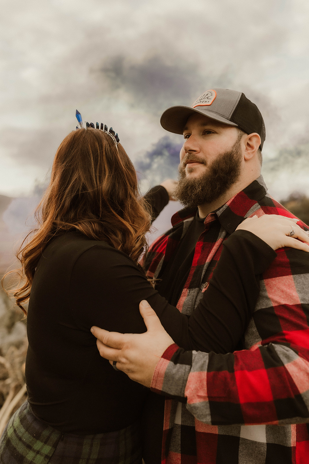 Stunning couple pose together in a pumpkin patch during their Upstate New York farm engagement photos