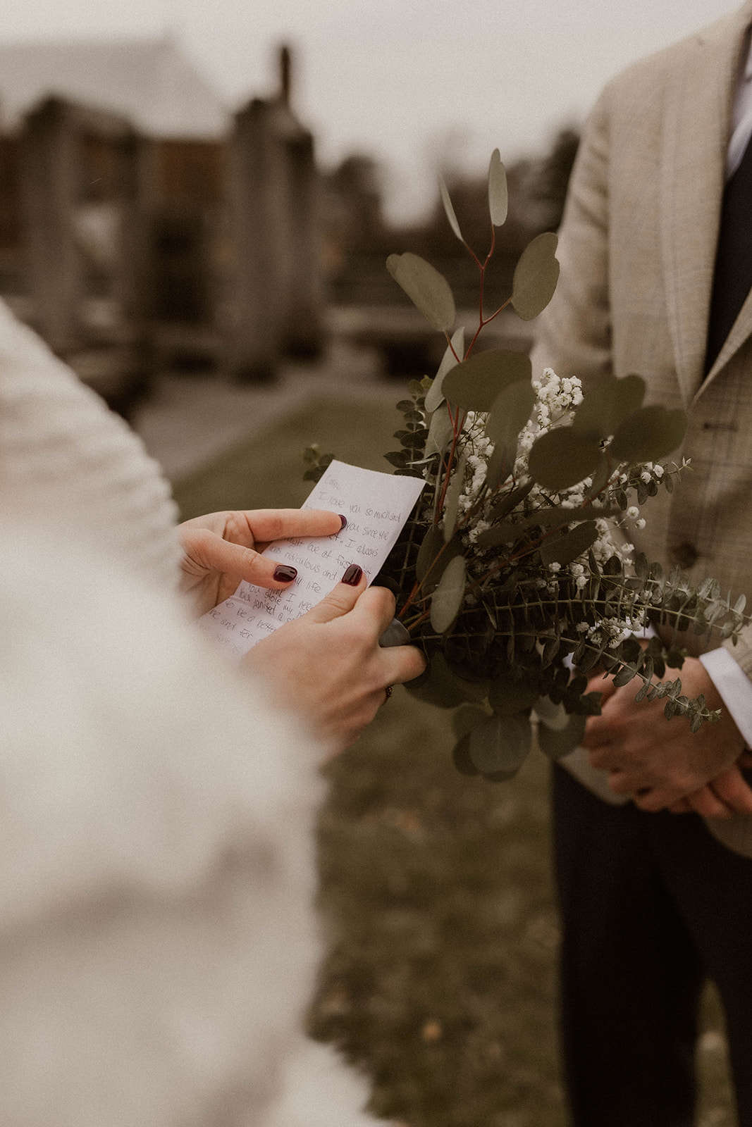 Intimate elopement ceremony in Albany, New York: exchanging vows amidst scenic beauty.