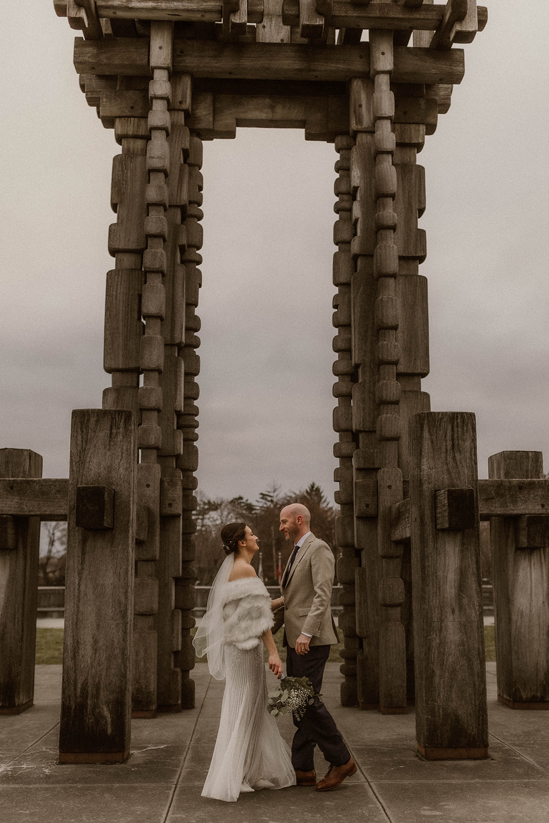 Intimate elopement ceremony in Albany, New York: exchanging vows amidst scenic beauty.