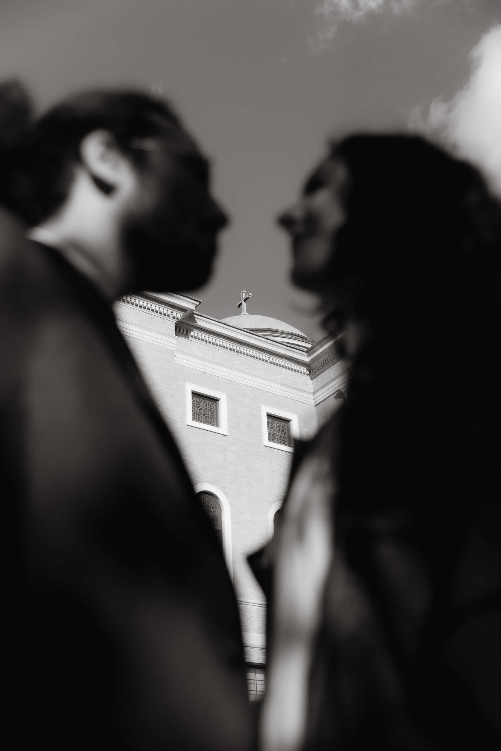 Courtney and George laughing together in Boston Common during their engagement session