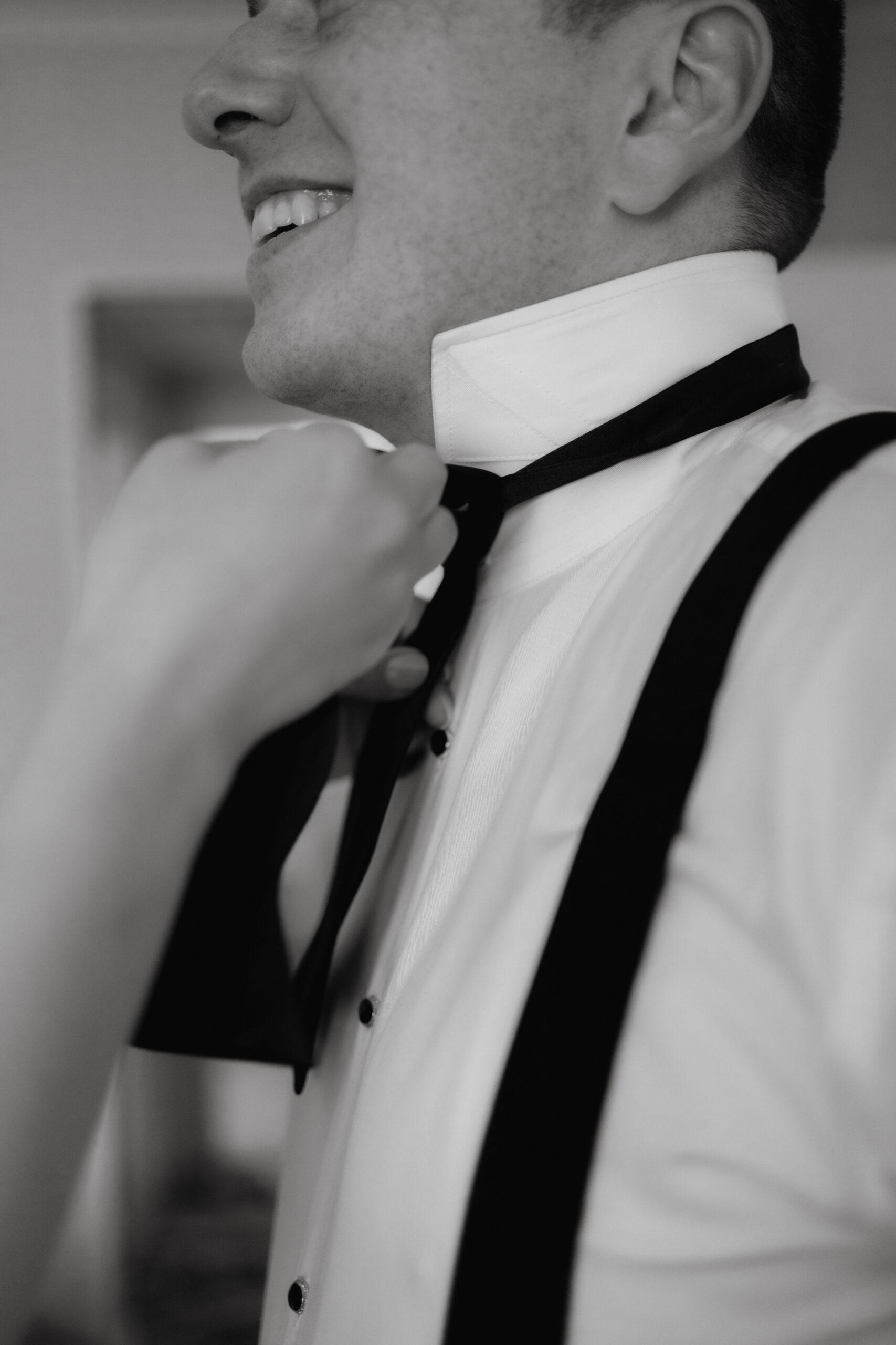 Bride getting ready in a suite at The Sagamore Resort during a fall wedding in Lake George