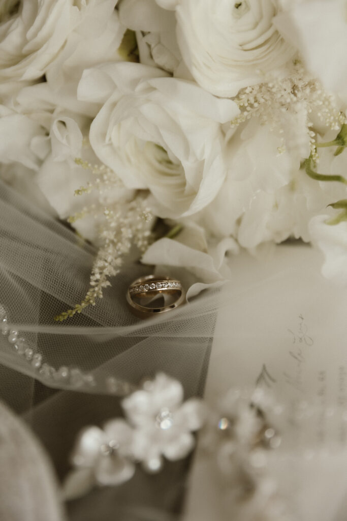 Bride getting ready in a suite at The Sagamore Resort during a fall wedding in Lake George