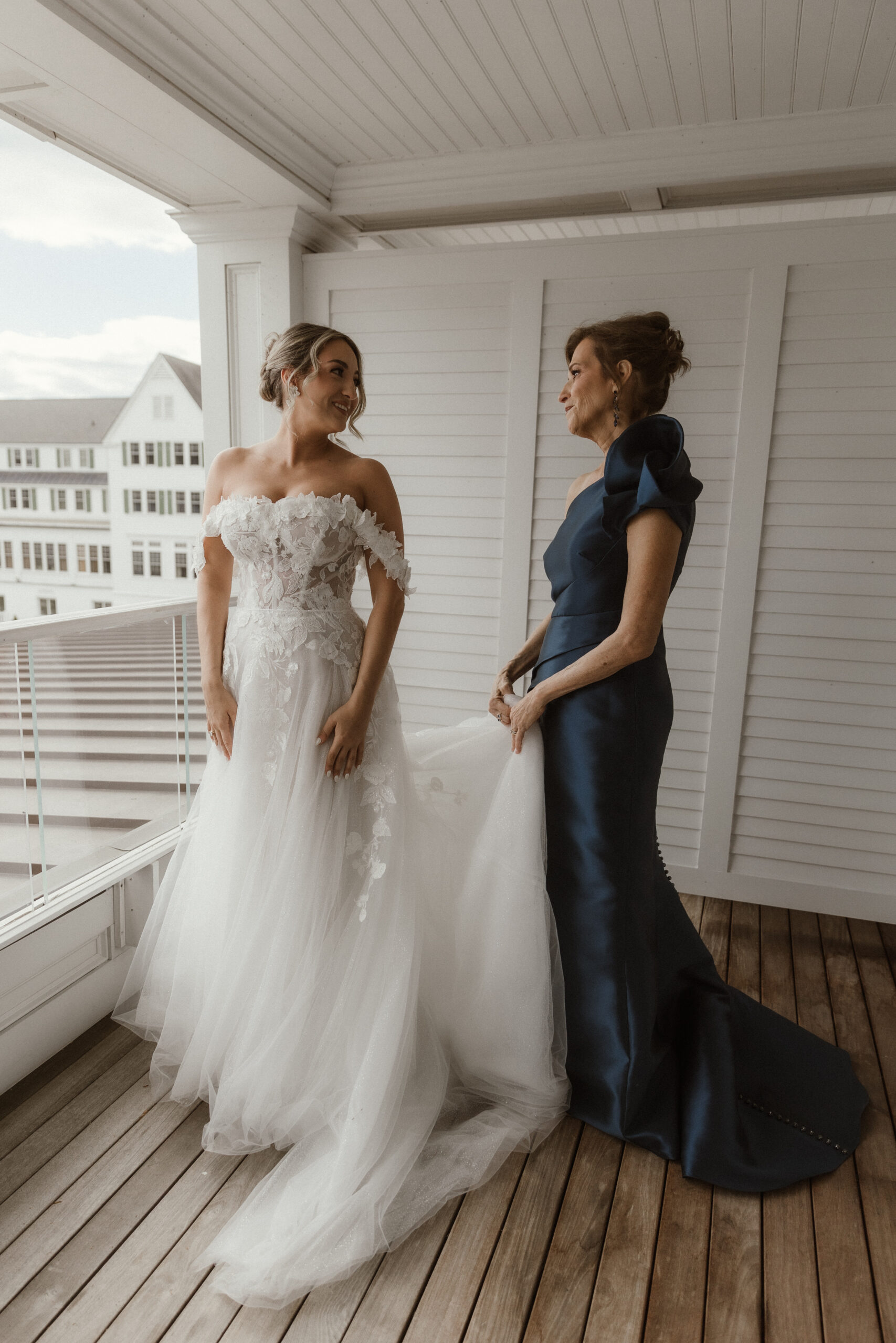 Bride getting ready in a suite at The Sagamore Resort during a fall wedding in Lake George